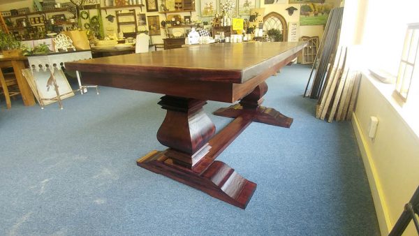 Expanding Carved Trestle dining table