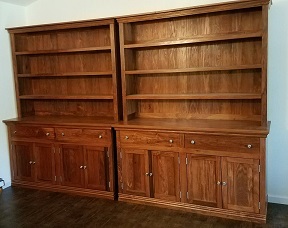large wooden cabinetry with shelving